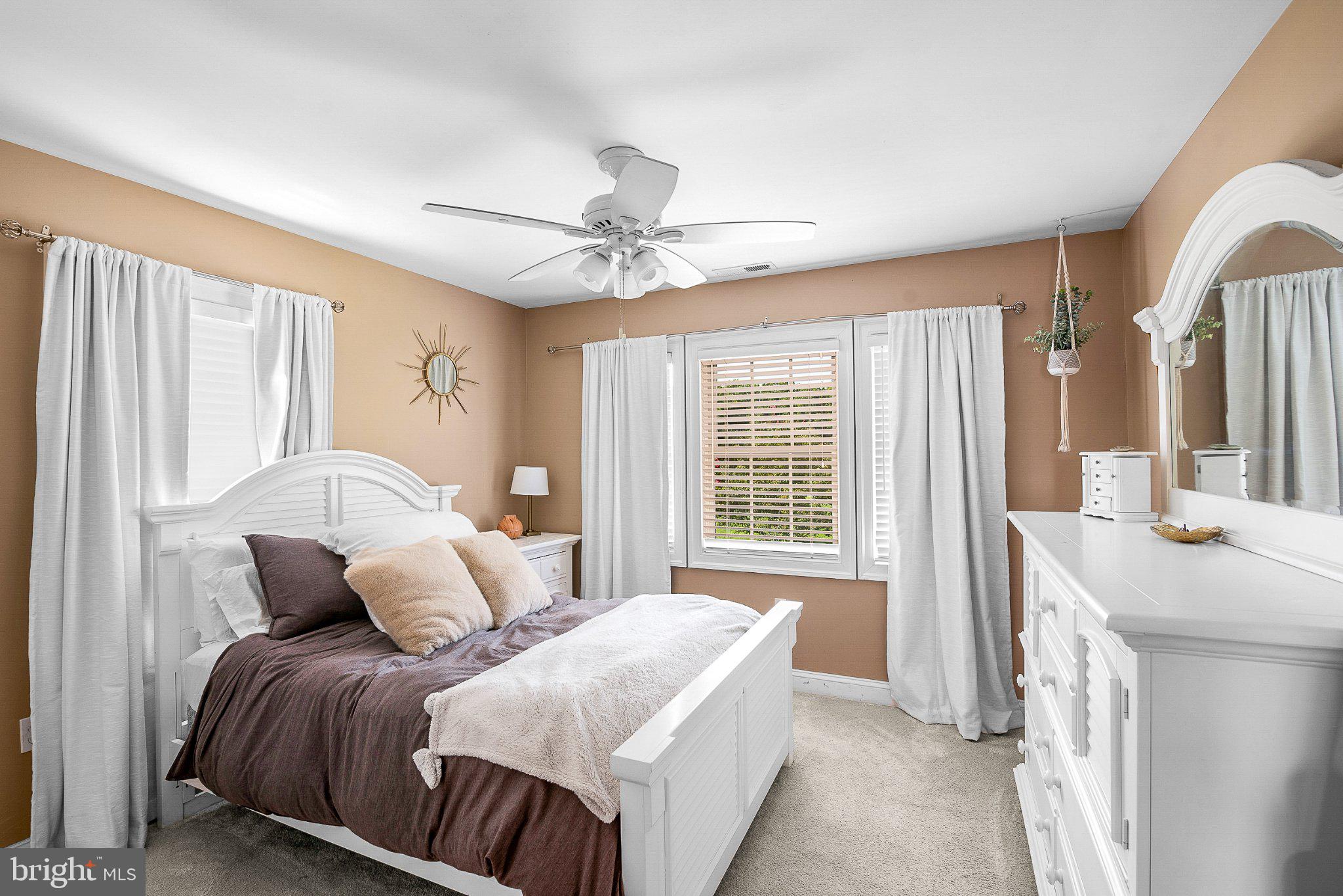 4401 Grove Road Trappe, MD 21673 - Photo 44 of 73 Serene bedroom with warm tones.