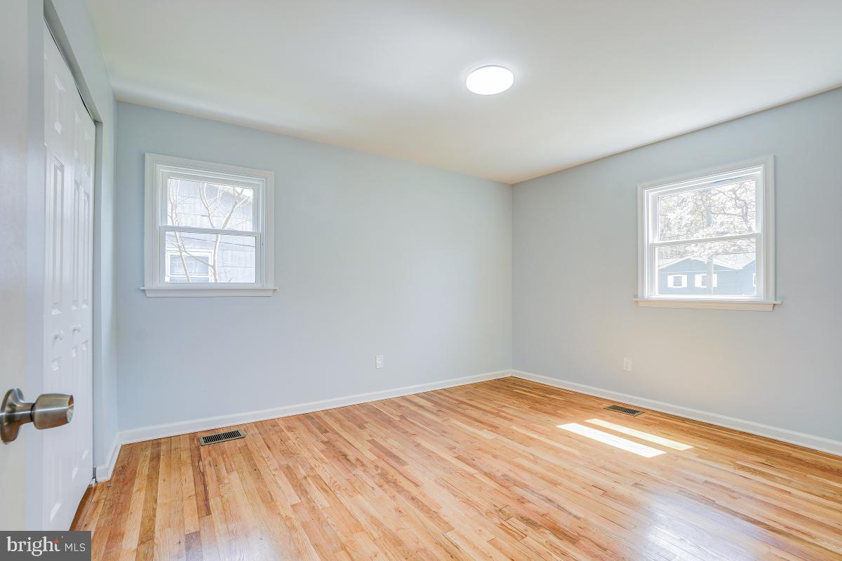 2654 Cory Terrace Silver Spring, MD 20902 - Photo 16 of 32 a view of empty room with wooden floor