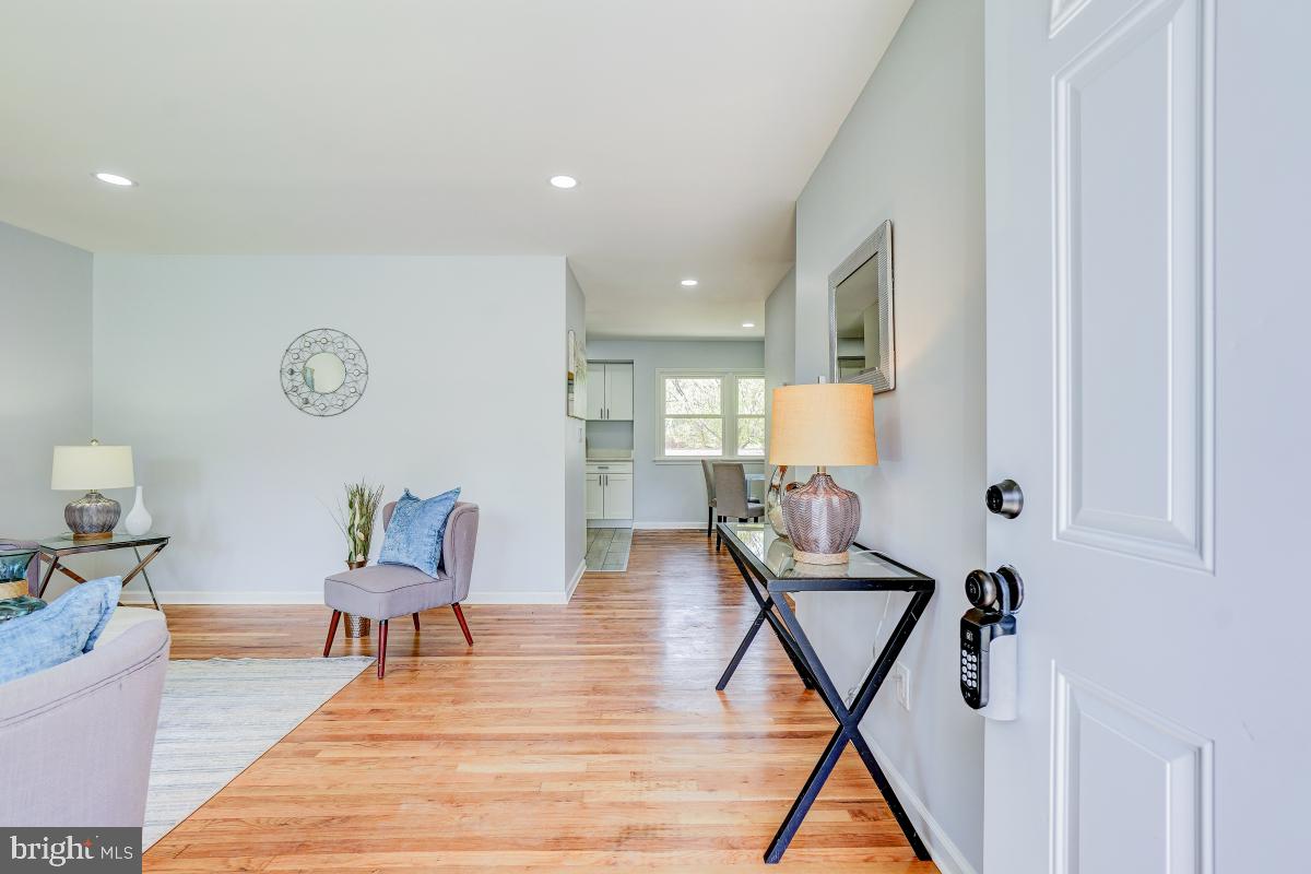 2654 Cory Terrace Silver Spring, MD 20902 - Photo 2 of 32 a living room with furniture and a wooden floor