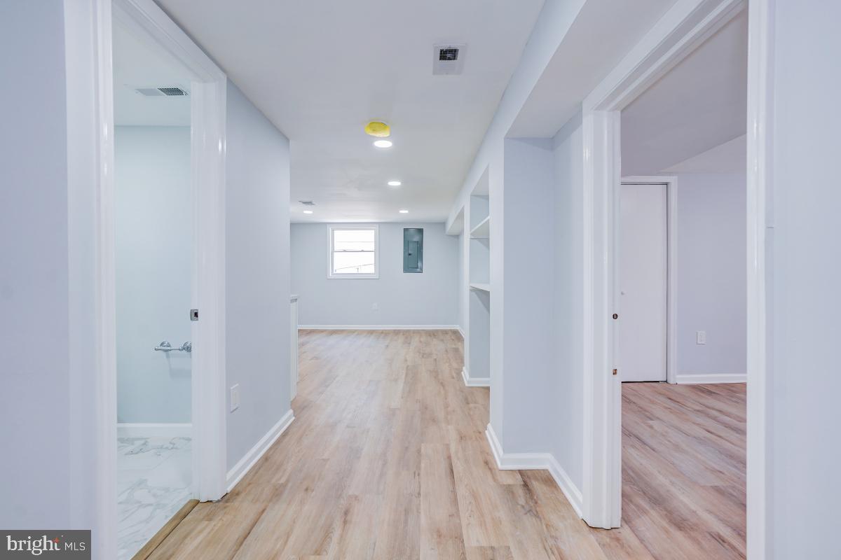 2654 Cory Terrace Silver Spring, MD 20902 - Photo 22 of 32 a view of hallway with wooden floor
