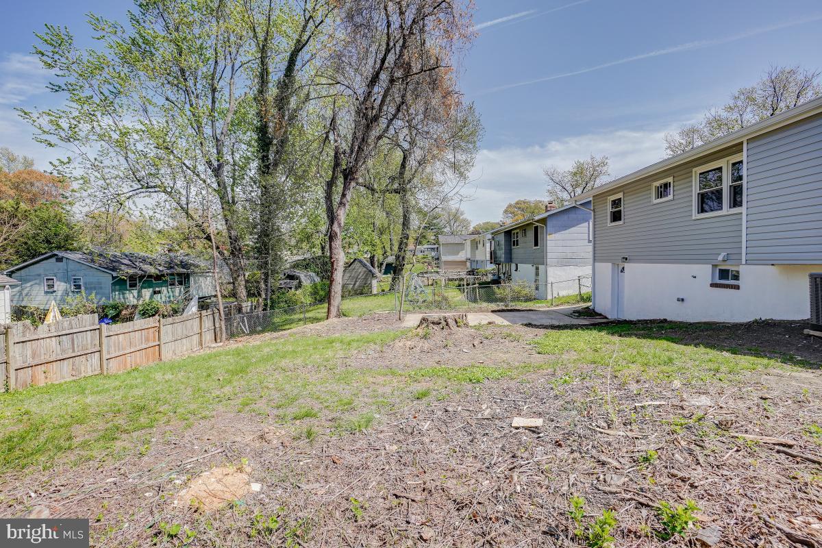 2654 Cory Terrace Silver Spring, MD 20902 - Photo 31 of 32 a view of a backyard with a large tree