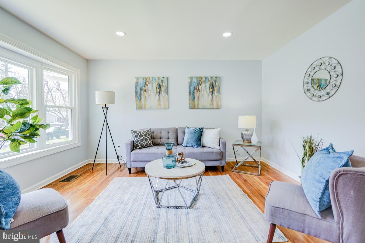 2654 Cory Terrace Silver Spring, MD 20902 - Photo 4 of 32 a living room with furniture a window and wooden floor