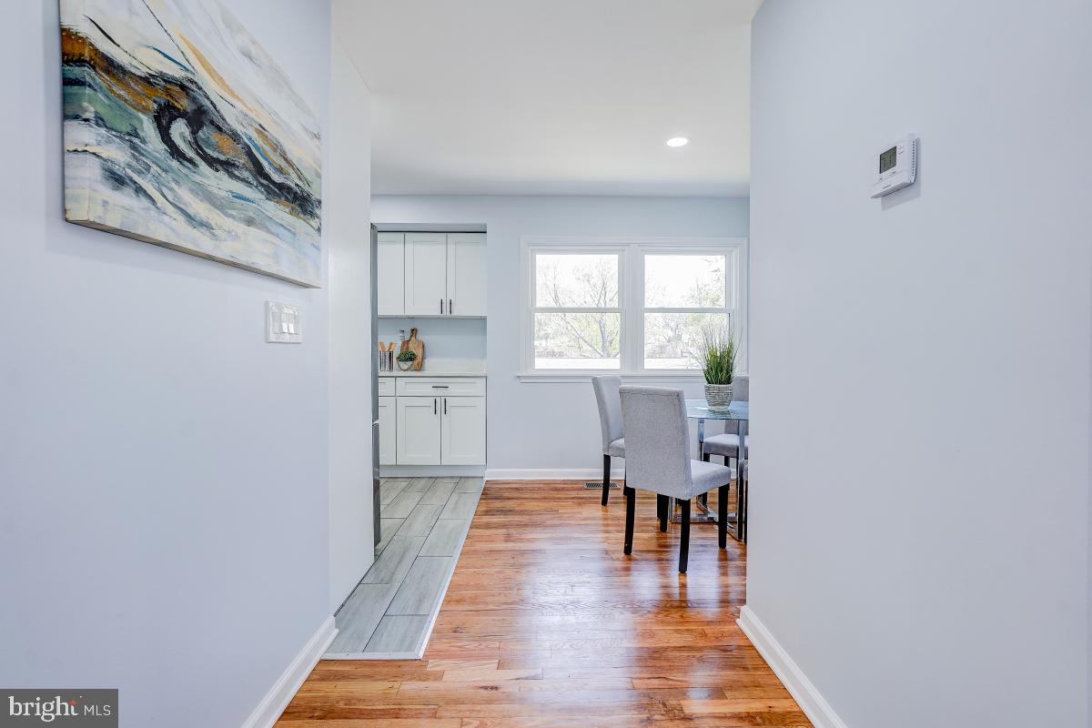 2654 Cory Terrace Silver Spring, MD 20902 - Photo 5 of 32 a view of a dining room with furniture and wooden floor