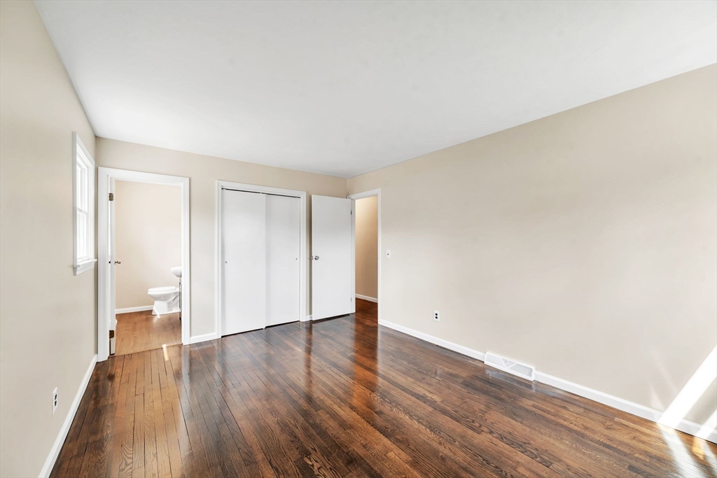230 Gilbert Avenue Springfield, MA 01119 - Photo 21 of 40 a view of an empty room with wooden floor