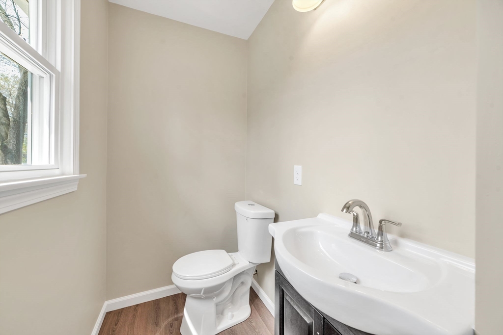 230 Gilbert Avenue Springfield, MA 01119 - Photo 22 of 40 a white toilet sitting next to a white sink