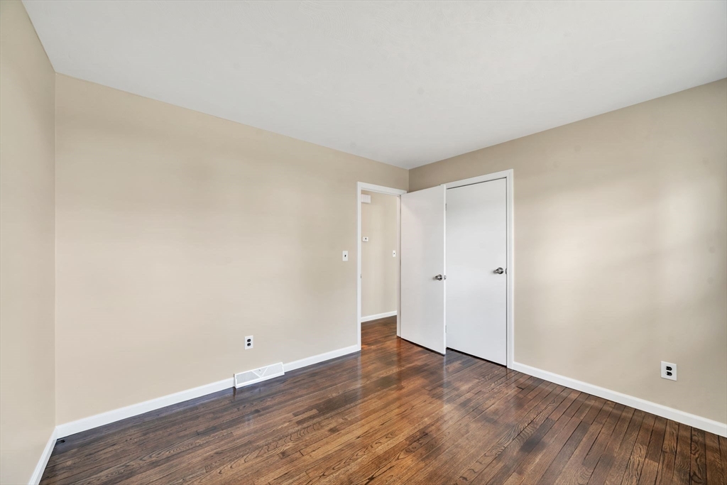 230 Gilbert Avenue Springfield, MA 01119 - Photo 26 of 40 a view of an empty room and wooden floor