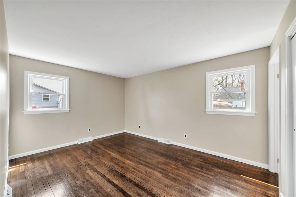 230 Gilbert Avenue Springfield, MA 01119 - Photo 29 of 40 a view of a room with wooden floor and window
