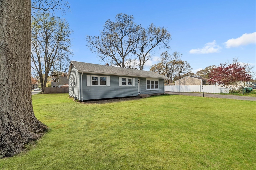 230 Gilbert Avenue Springfield, MA 01119 - Photo 3 of 40 a view of a house with a yard