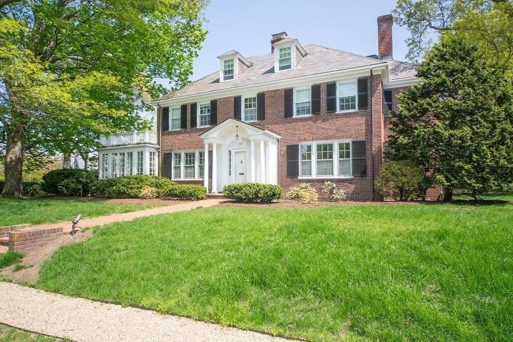 10 Locke Road Newton, MA 02468 - Photo 14 of 16 a front view of a house with a yard