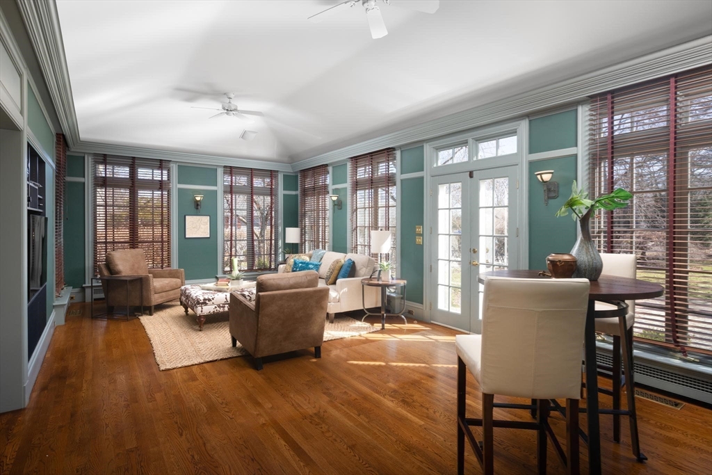 10 Locke Road Newton, MA 02468 - Photo 7 of 16 a living room with furniture and large windows
