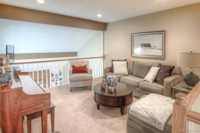 a living room with furniture and a couch