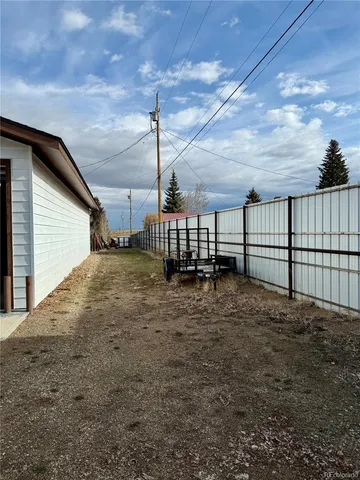 a house view with a backyard space