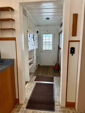 a view of a workspace with furniture