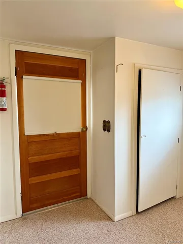a view of room with furniture and a flat screen tv