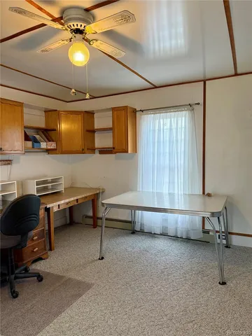 a view of a big room with that has a bed