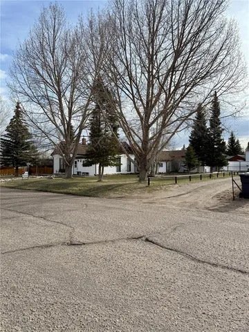 a view of road with trees