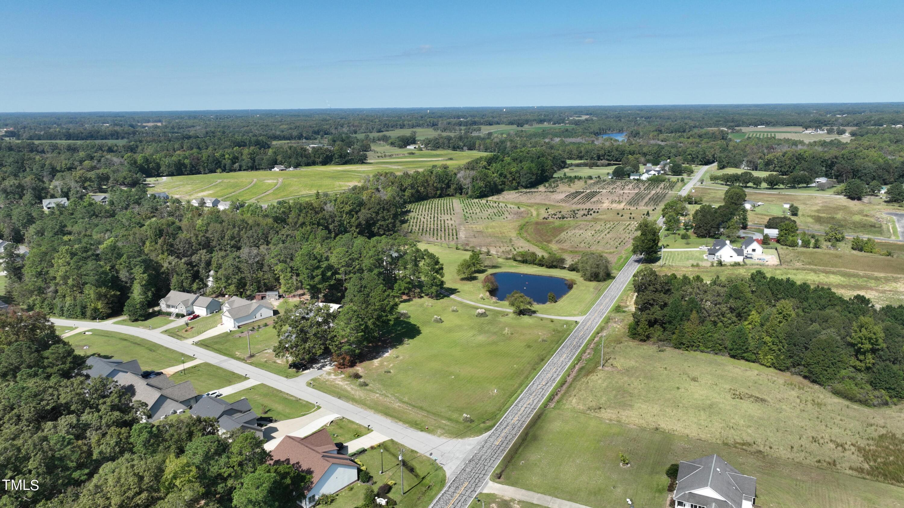 0 Old Stage Road North Angier, NC 27501 - Photo 1 of 17 an aerial view of a house with a yard