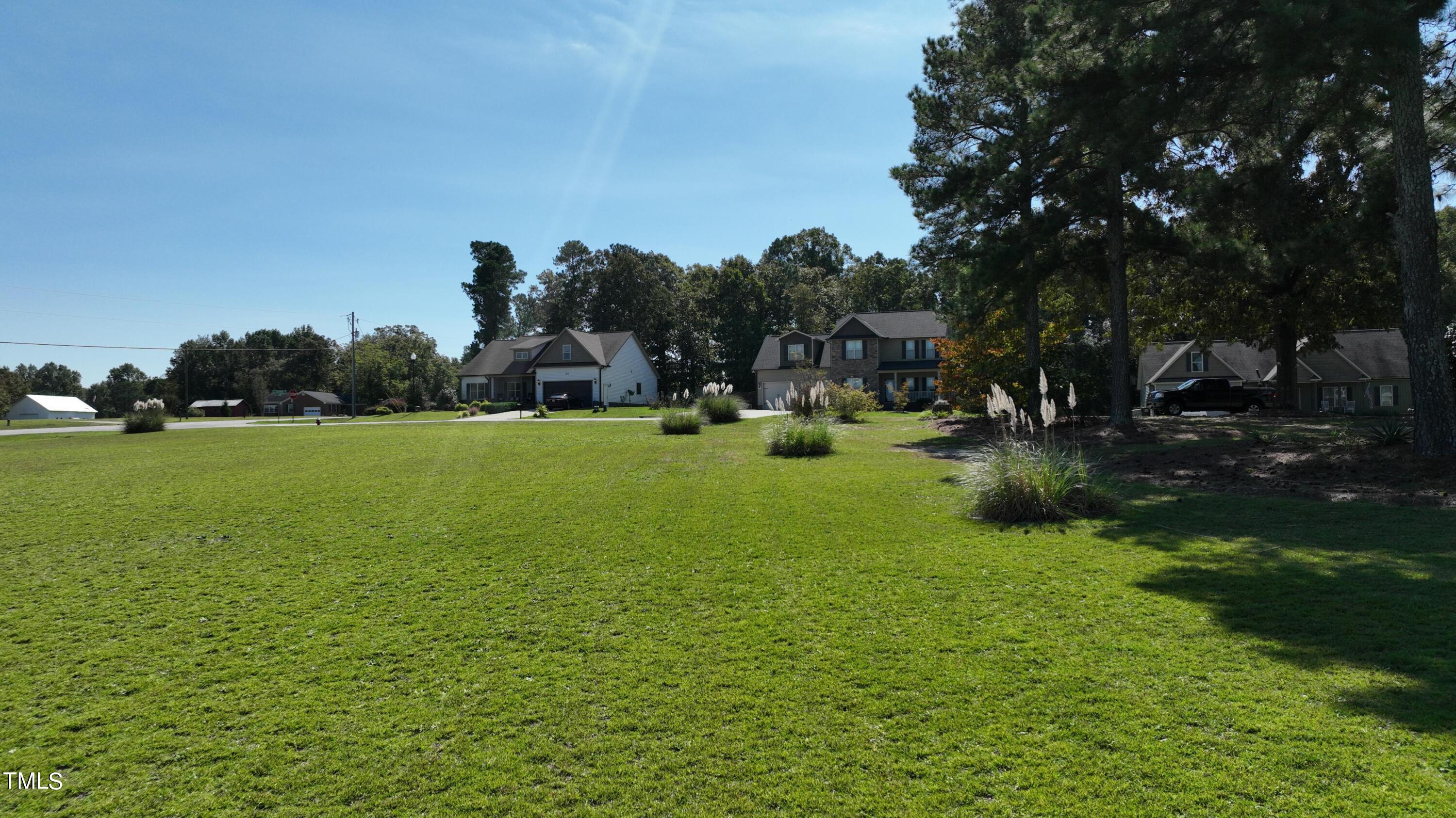 0 Old Stage Road North Angier, NC 27501 - Photo 11 of 17 a backyard of a house with lots of green space