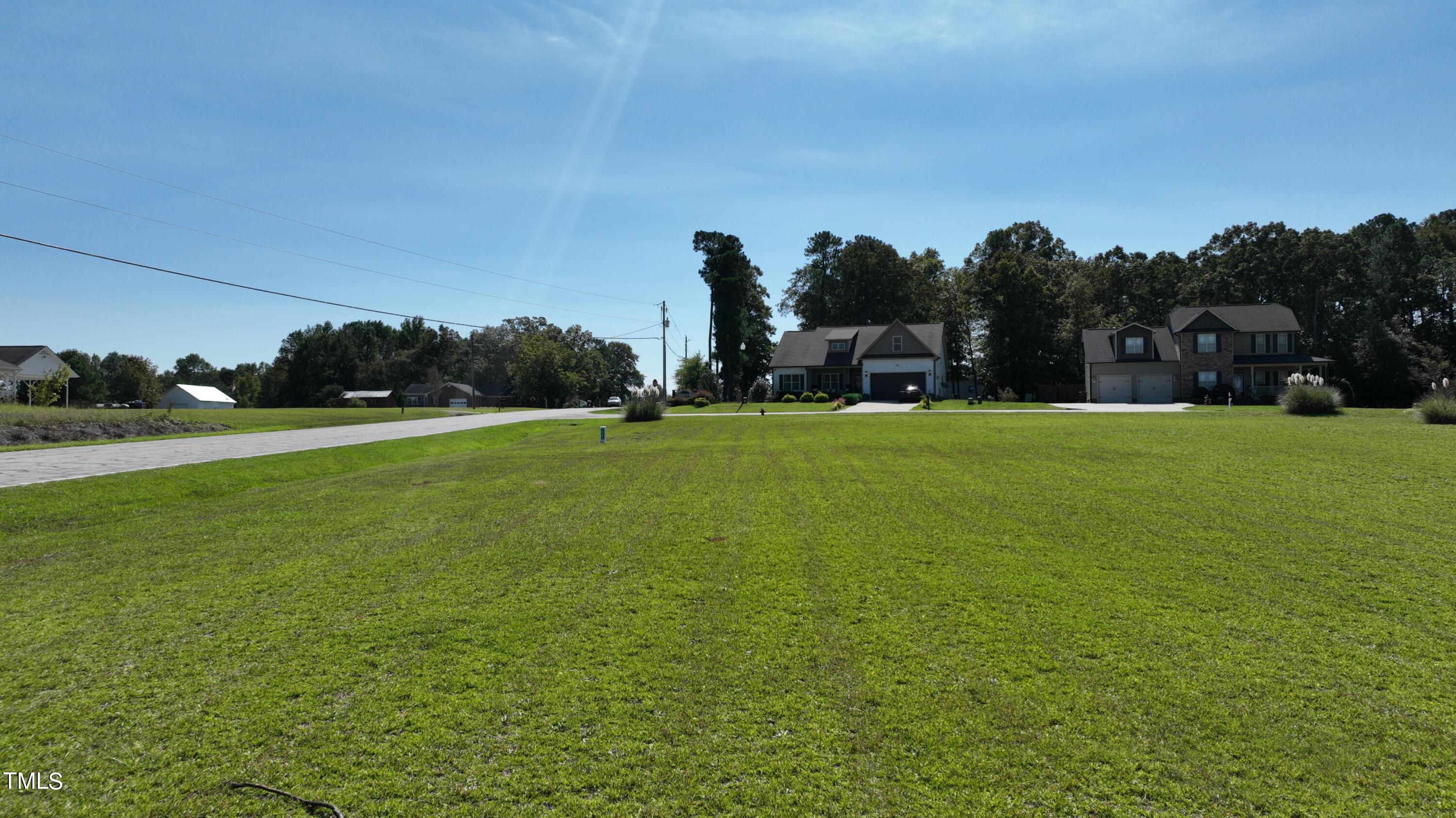 0 Old Stage Road North Angier, NC 27501 - Photo 12 of 17 a view of a field of grass and trees