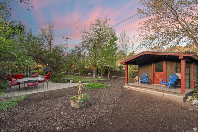 10280 Dimple Dell Road Sandy, UT 84092 - Photo 28 of 58 Fenced backyard with an extra built storage