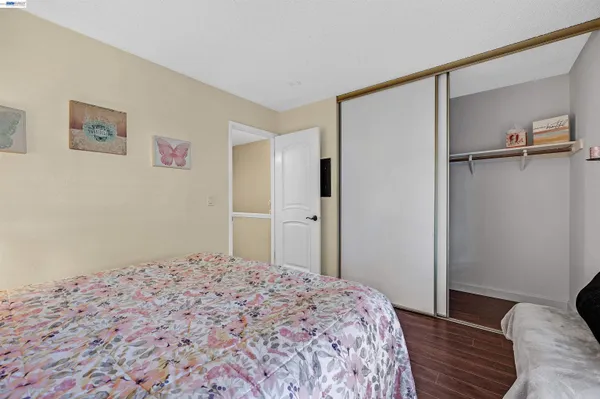 a view of a house with backyard porch and sitting area