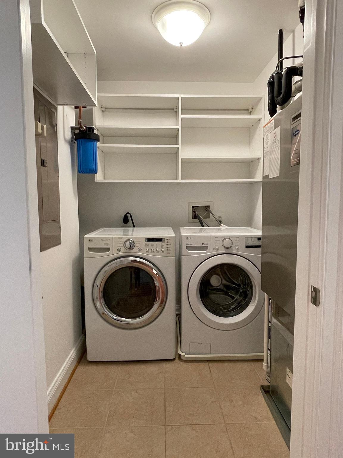 1781 Chain Bridge Road, Unit 201 McLean, VA 22102 - Photo 26 of 51 Laundry Room with built-in shelves
