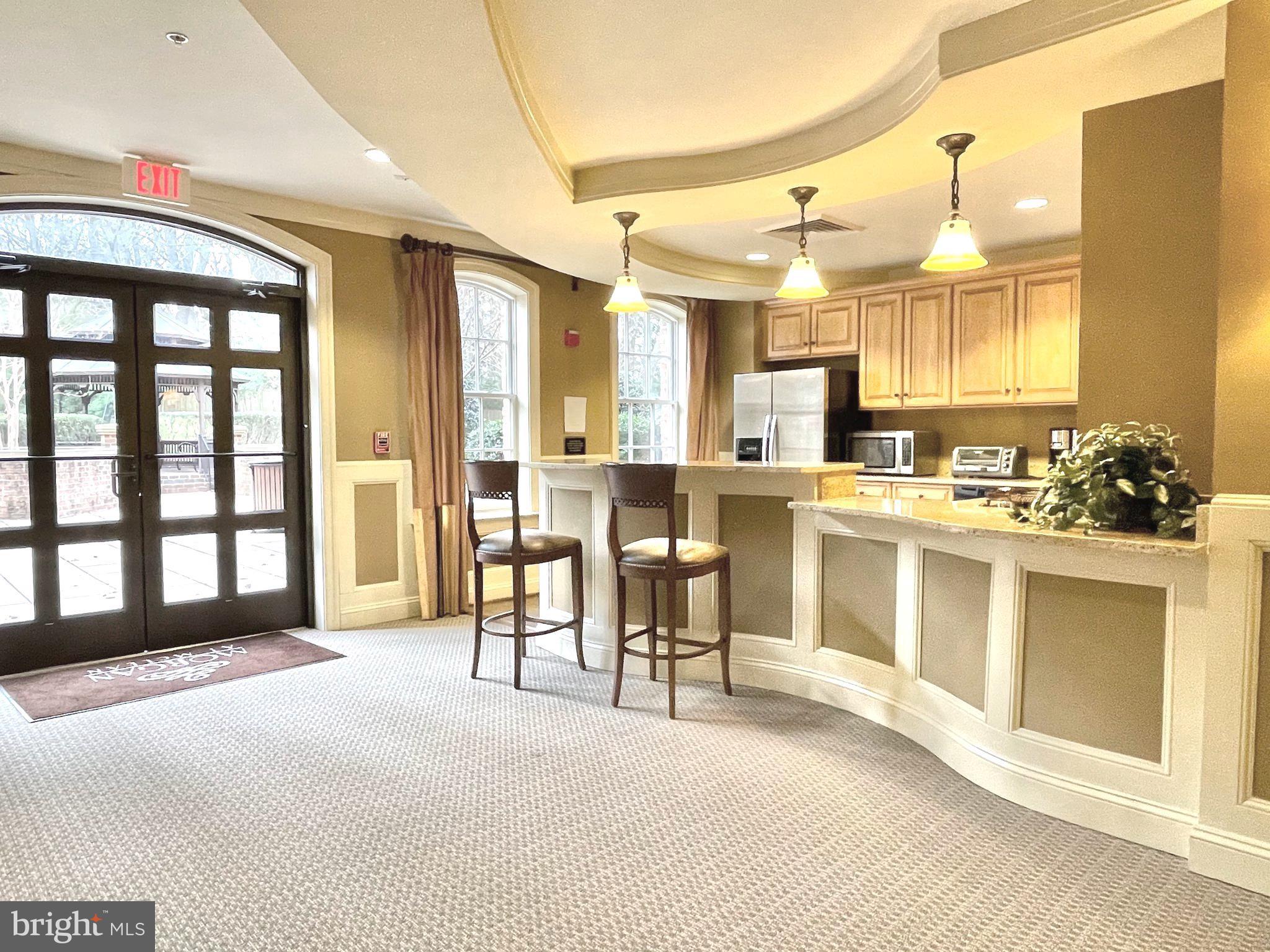 1781 Chain Bridge Road, Unit 201 McLean, VA 22102 - Photo 37 of 51 Party Room leads to the Courtyard