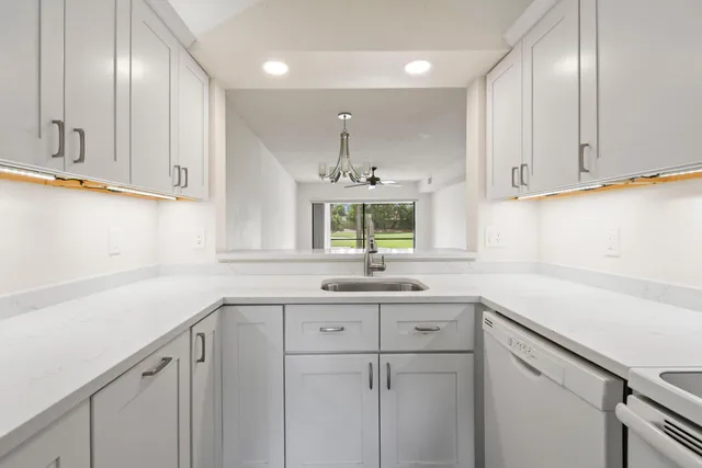 a white toilet sitting next to a bath tub shower