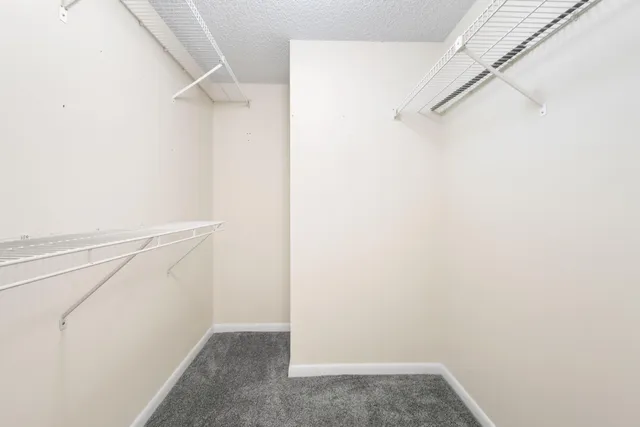 a view of a park with swings and slides