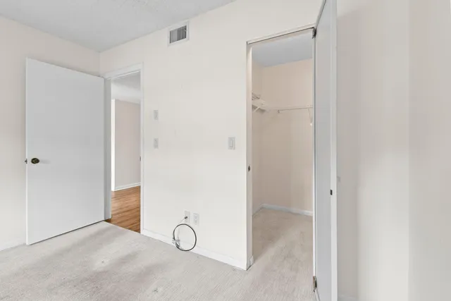 an aerial view of a houses with outdoor space and lake view