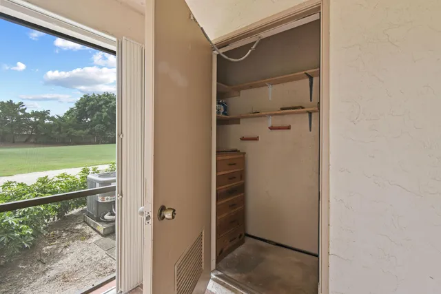 an aerial view of a house with a garden and plants