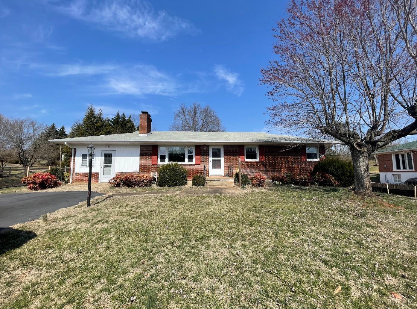 363 Lynbrook Road Rustburg, VA 24588 - Photo 1 of 19 a front view of a house with a yard