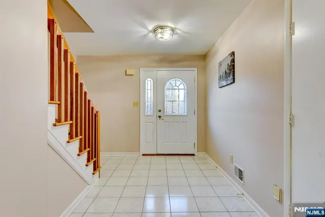 a view of a hallway with entryway