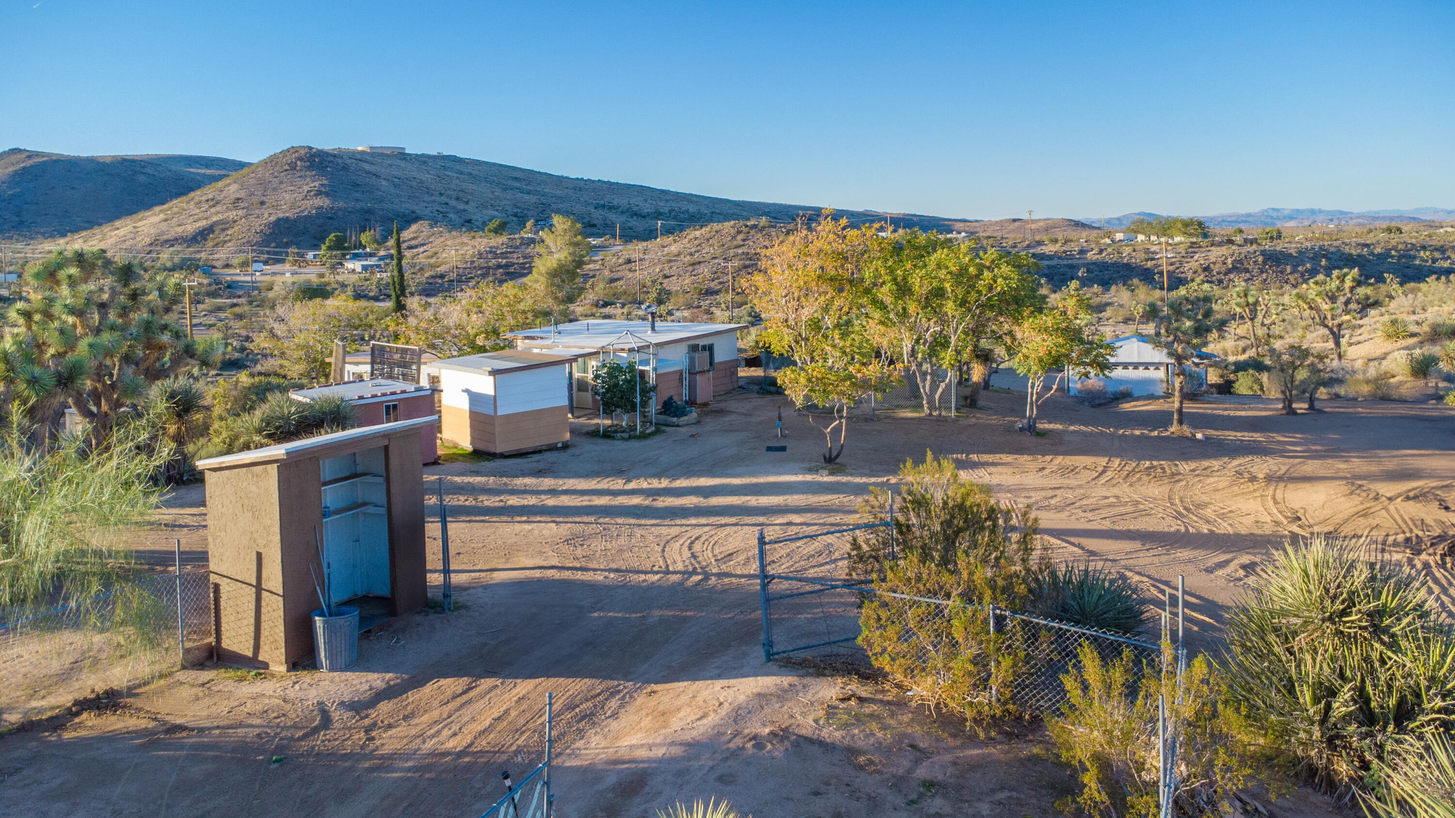 56606 Skyline Ranch Road Yucca Valley, CA 92284 - Photo 11 of 19 a view of balcony with two chairs and a table