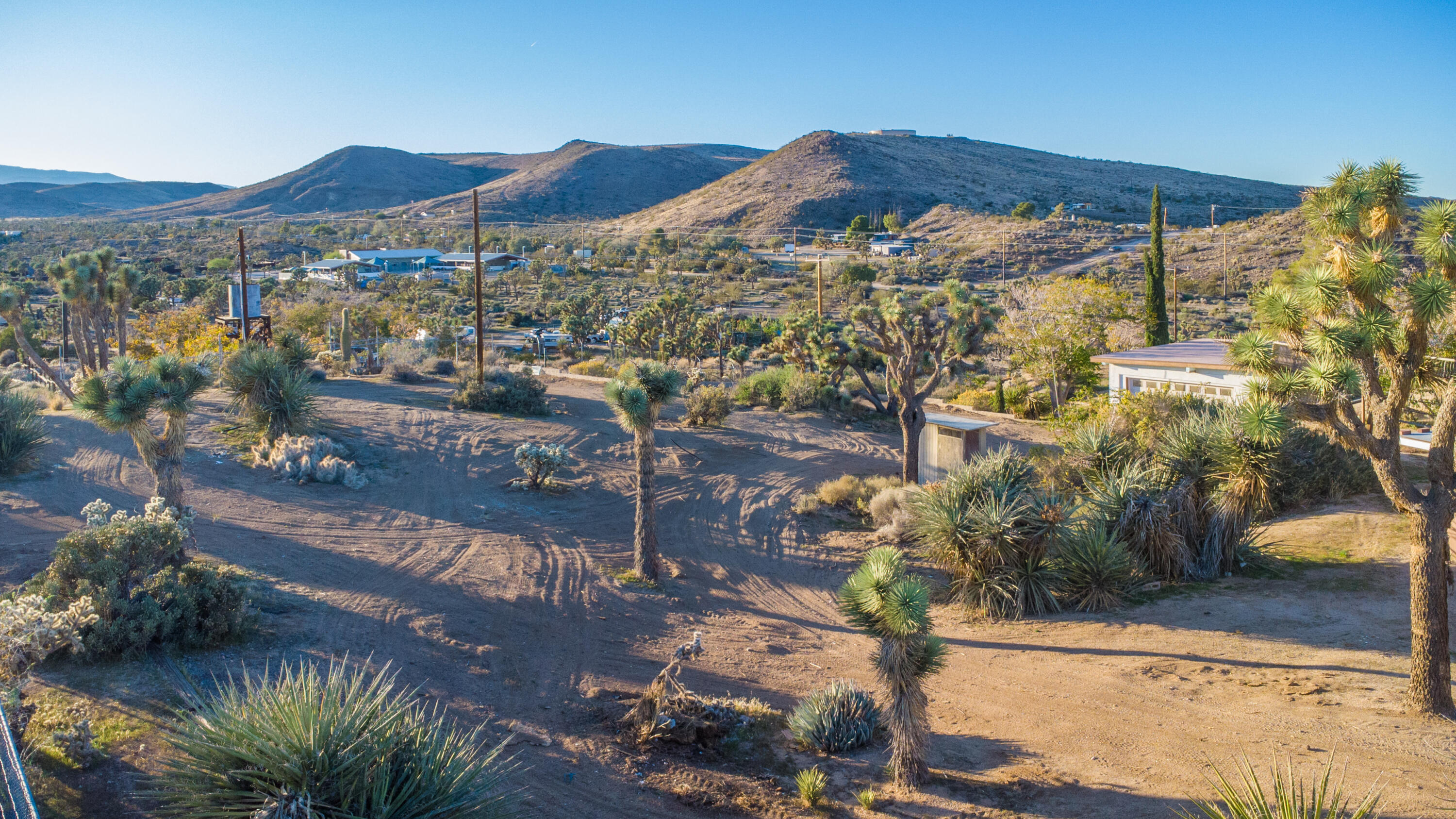 56606 Skyline Ranch Road Yucca Valley, CA 92284 - Photo 13 of 19 a view of a city with a lake