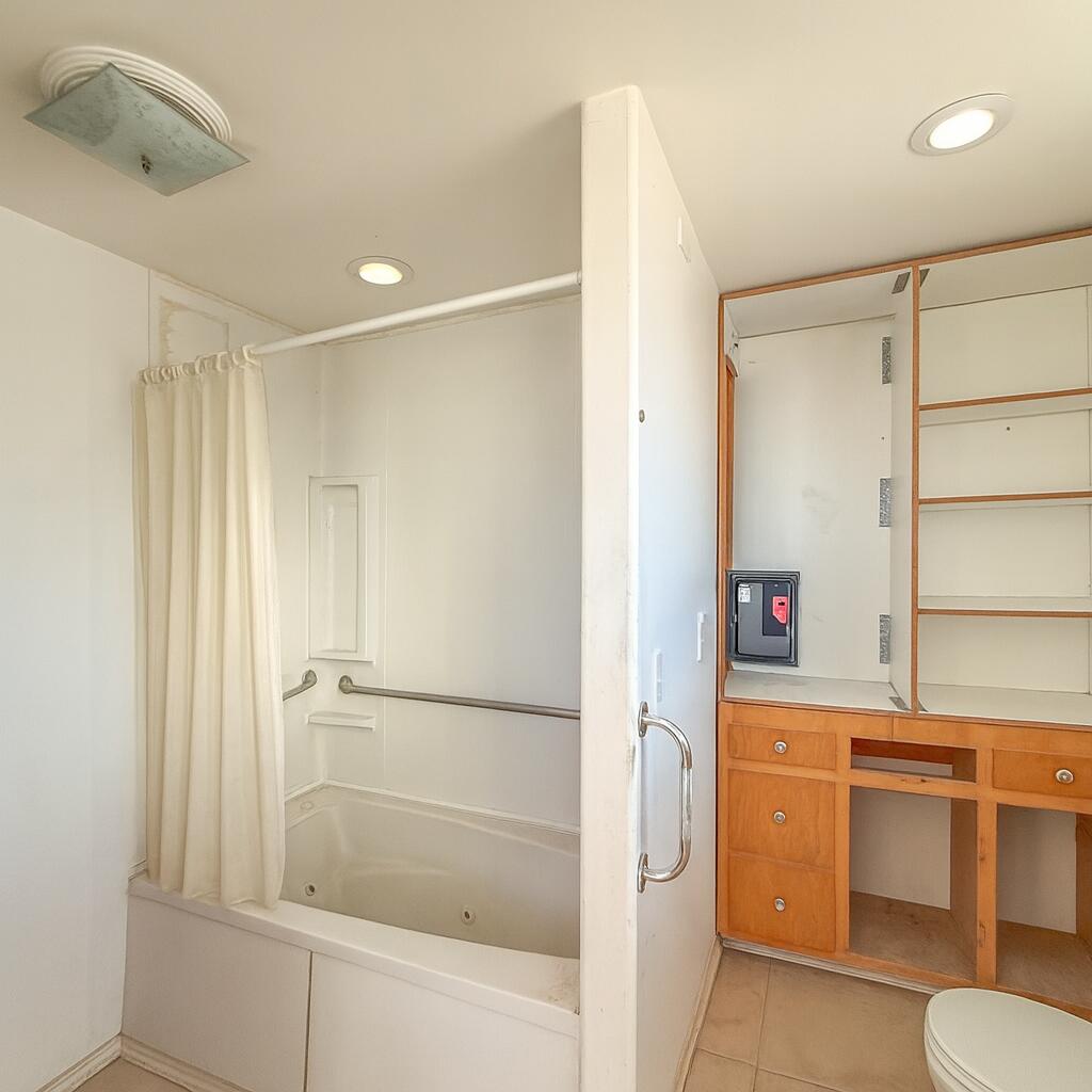 56606 Skyline Ranch Road Yucca Valley, CA 92284 - Photo 8 of 19 a bathroom with a shower and a sink