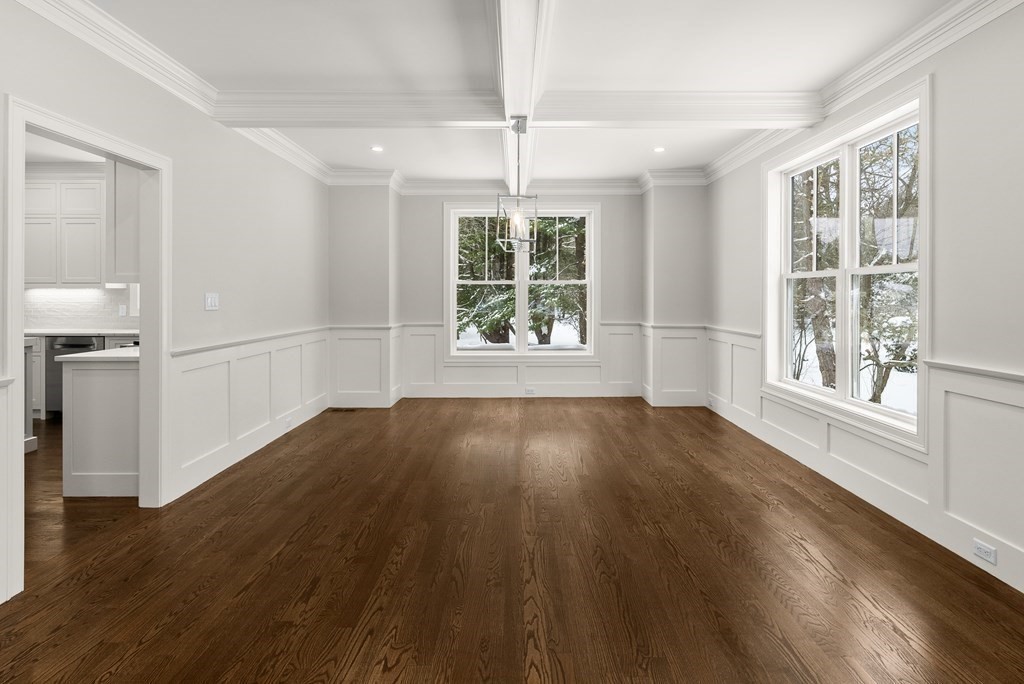 17 Saddle Club Road Lexington, MA 02420 - Photo 4 of 32 a view of an empty room with wooden floor and a window