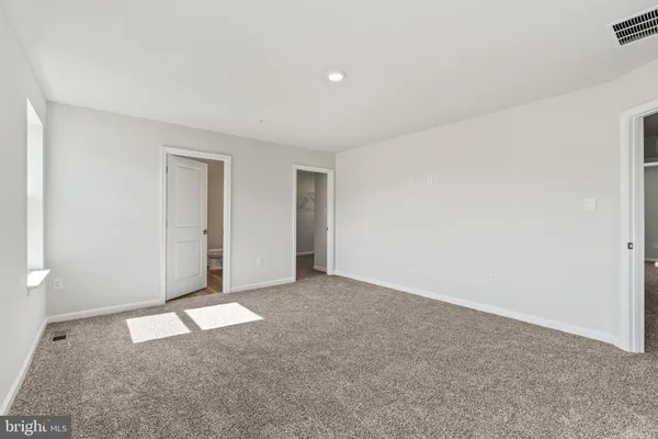an empty room with an entryway