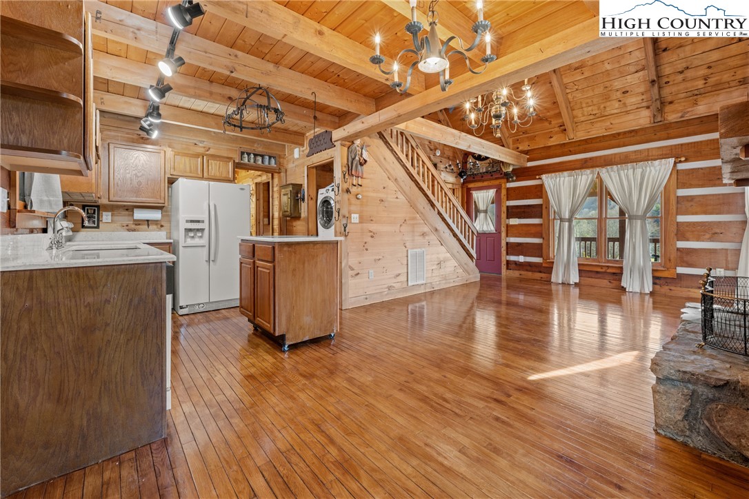 183 Laurel Branch Road Vilas, NC 28692 - Photo 12 of 39 a view of entryway and hall with wooden floor
