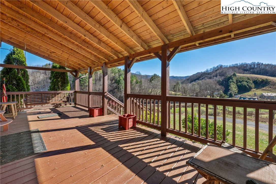 183 Laurel Branch Road Vilas, NC 28692 - Photo 5 of 39 a view of a chairs and tables in the patio