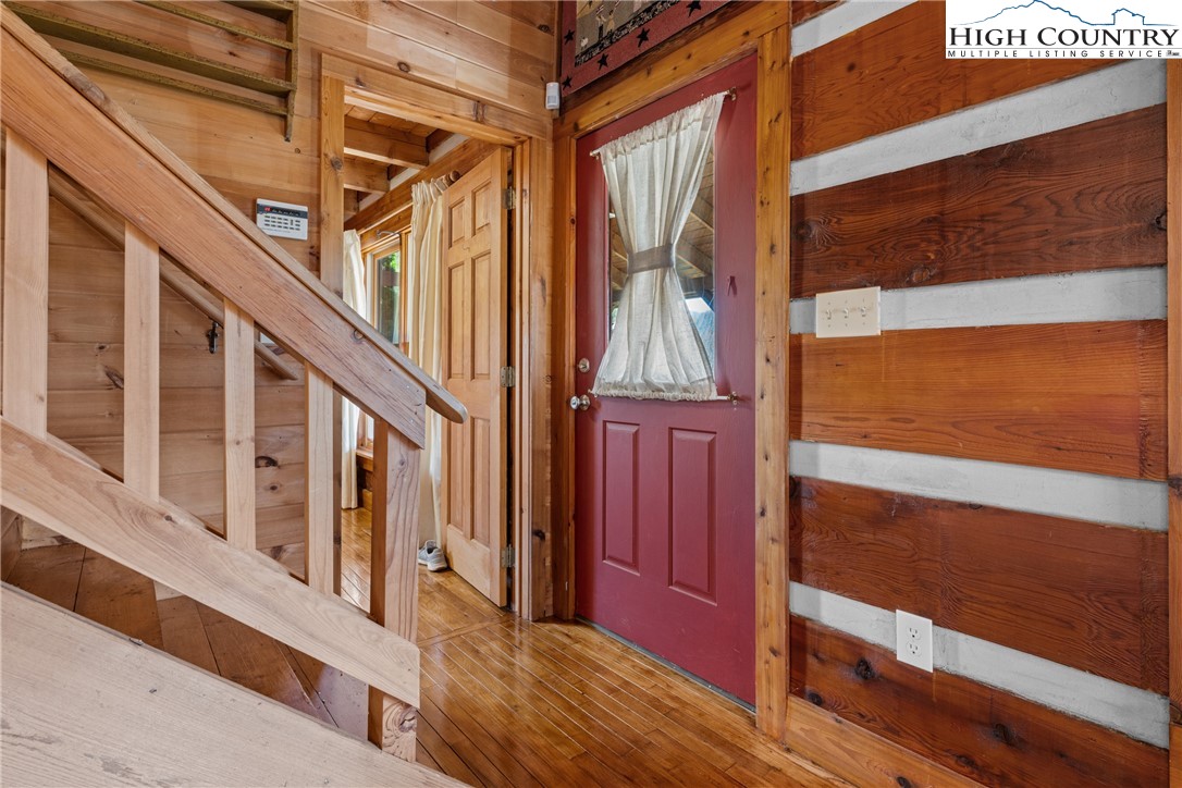 183 Laurel Branch Road Vilas, NC 28692 - Photo 6 of 39 a view of an entryway with a small yard