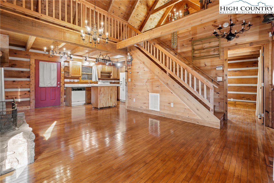 183 Laurel Branch Road Vilas, NC 28692 - Photo 8 of 39 a view of entryway and hall with wooden floor