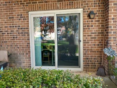 613 West Central Road, Unit A8 Mount Prospect, IL 60056 - Photo 3 of 23 a view of a brick house with a large window