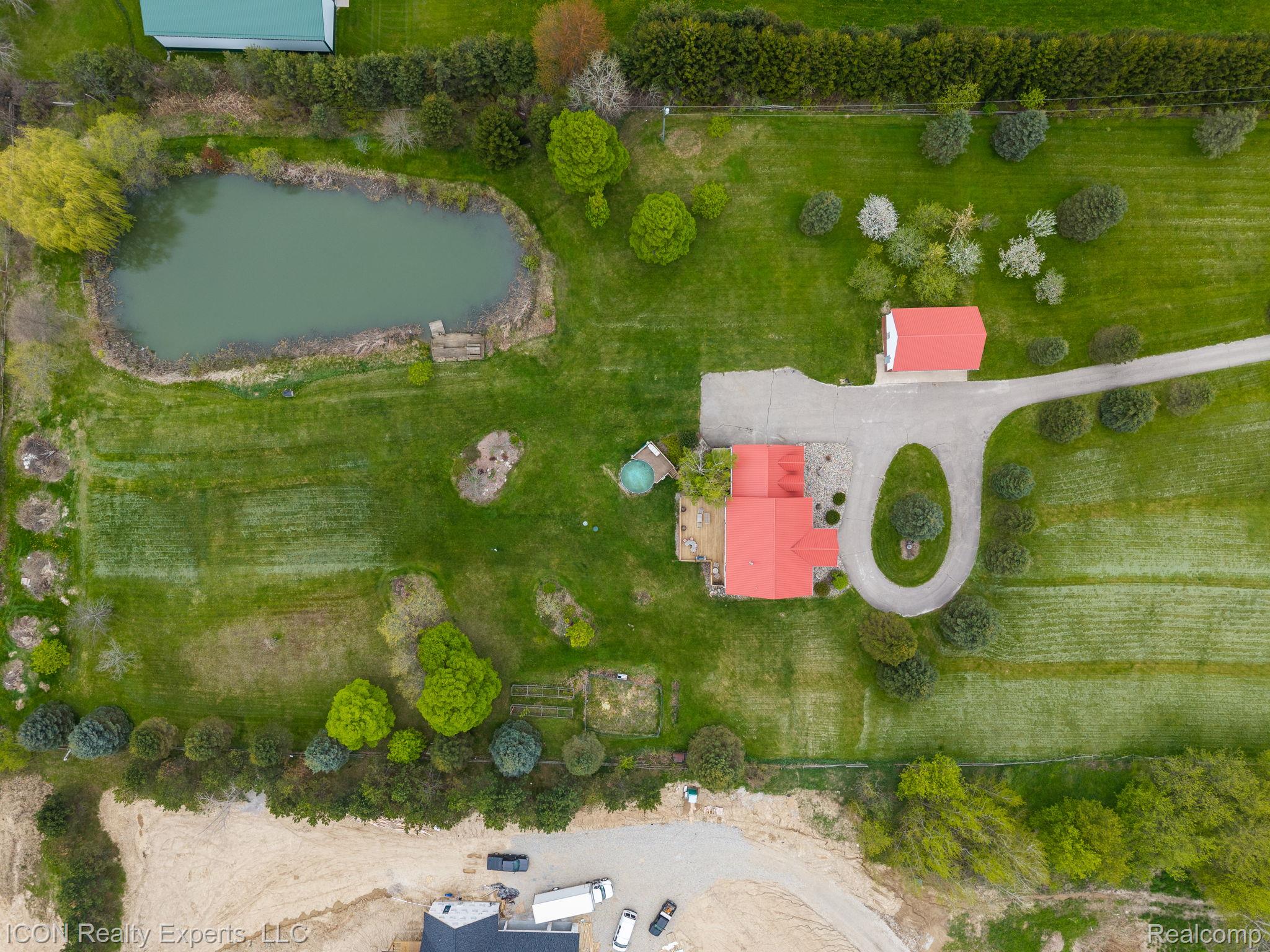 5128 Baldwin Road Metamora, MI 48455 - Photo 64 of 68 Drone / aerial view of a large body of water