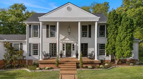 front view of house with a yard