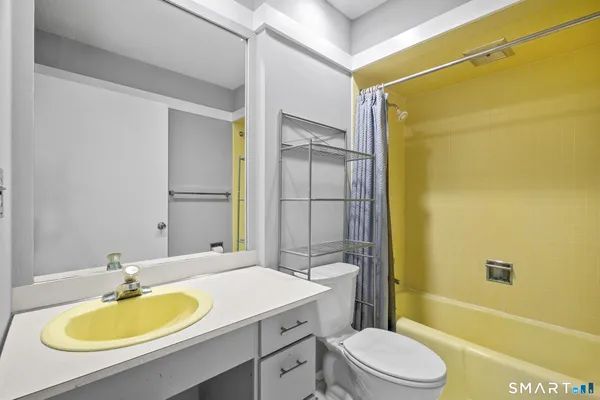 a view of a room with a hallway