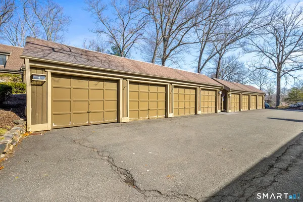 a view of a garage with stairs