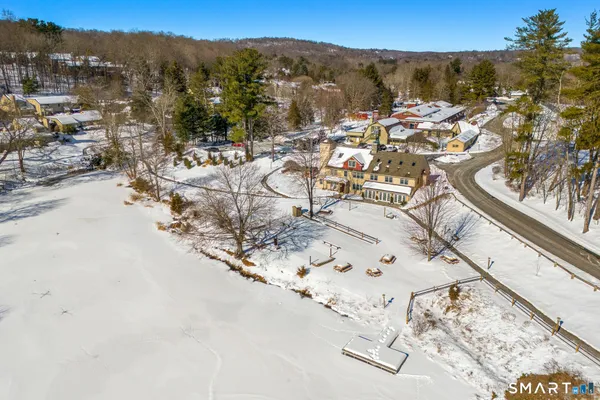 an aerial view of residential house with parking space