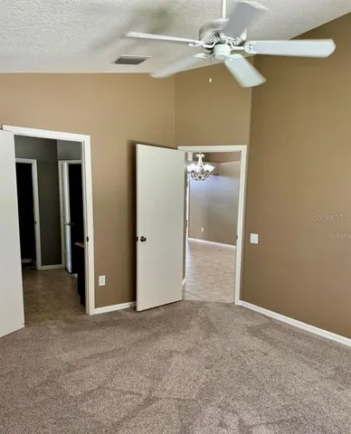 a bathroom with a shower and a sink