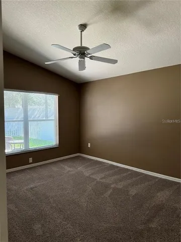 a large bathroom with double vanity and a large mirror